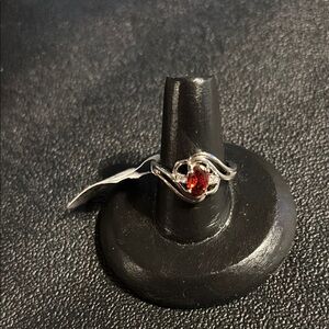 Elegant Silver and Red Gemstone Ring